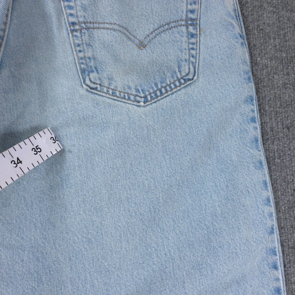 VINTAGE Levis 560 Loose Fit Tapered Leg Jeans Light Wash Blue Mens Denim 34x32